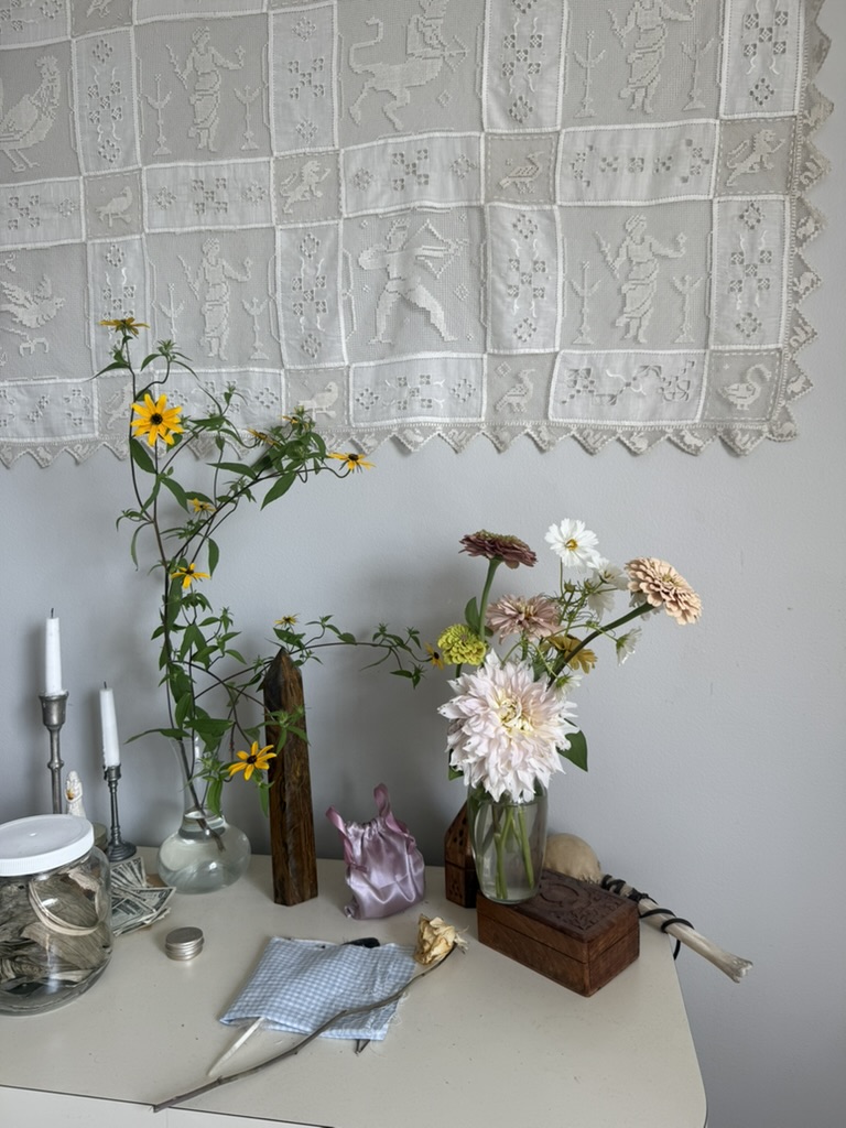 flowers, candles, and handmade objects