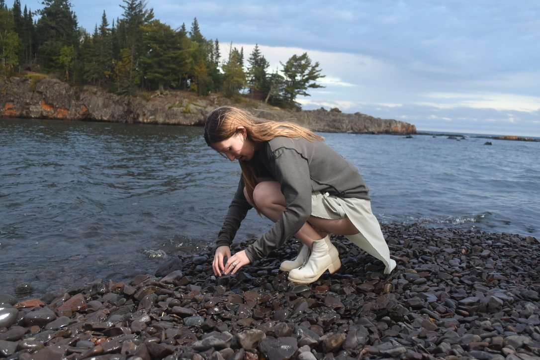 gathering stones on the shore of lake superior